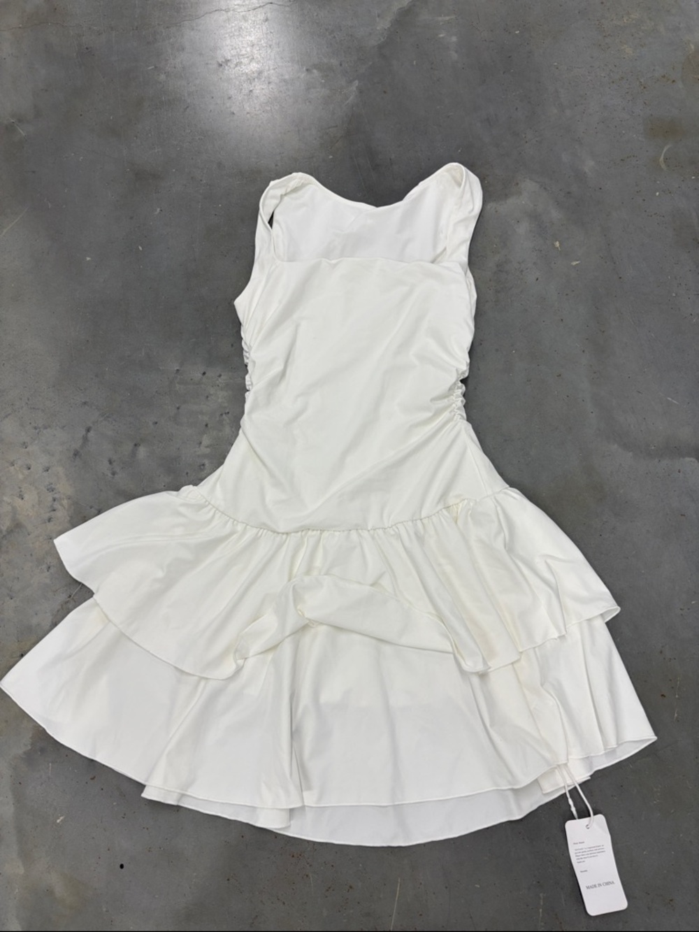 Sleeveless White Tiered Mini Dress with Ruffle Hem